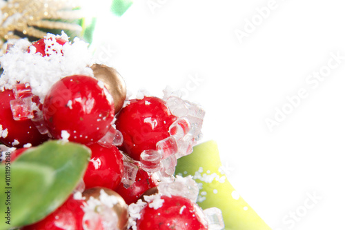 Christmas postcard landscape. Red decorations with green vegetation, ice and snow