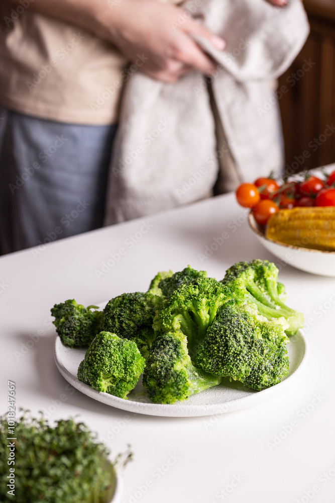 Broccoli on a plate for preparing a healthy lunch Broccoli on a plate for preparing a healthy lunch