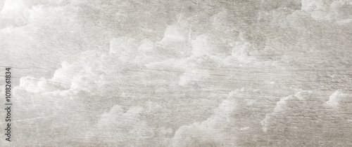 White clouds and sky on wood texture. Vintage art background. Grey old wood vector texture. Hand drawn grunge illustration. Aged painted template.