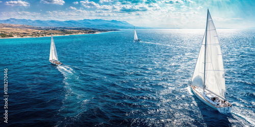 Luxury sailboats regatta sailing in the sea near coastline