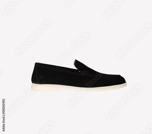 suede loafer with a cream color sole, men's casual leather shoes, isolated on white background.