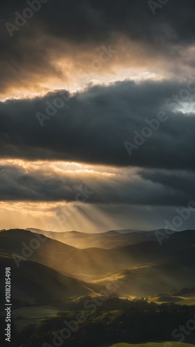 A moody sky with heavy gray clouds and soft sunlight peeking through, creating a dramatic contrast between light and shadow 