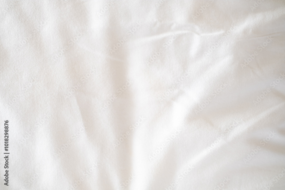 Abstract White Bedding Sheets or White wrinkled fabric background texture and Texture with copy-space :Creased or wrinkled white fabric,Soft focus Abstract White Bedding Sheets or White wrinkled fabric background texture and Texture with copy-space :Creased or wrinkled white fabric,Soft focus
