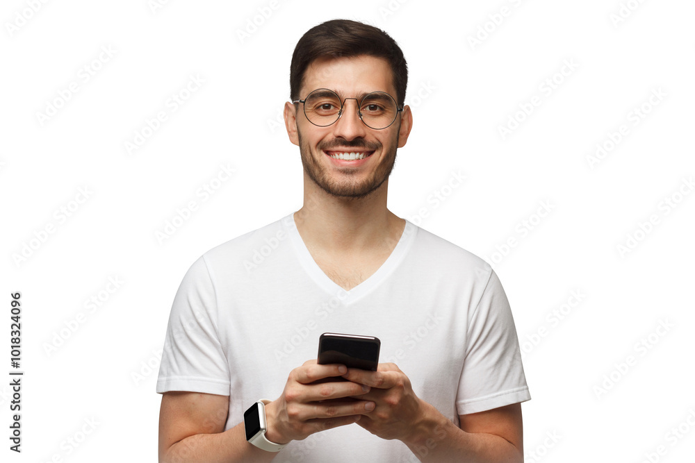 Handsome man looking straight at camera while holding his phone Handsome man looking straight at camera while holding his phone