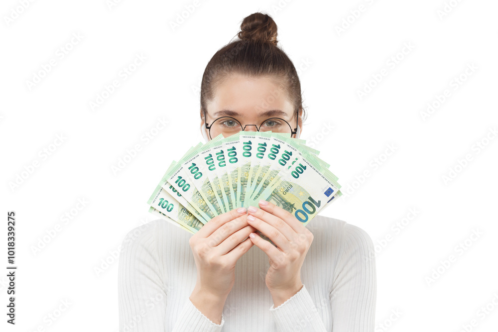 Young student girl in glasses and turtleneck hiding behind fan of 100 hundred euro cash, satisfied with her lottery prize Young student girl in glasses and turtleneck hiding behind fan of 100 hundred euro cash, satisfied with her lottery prize