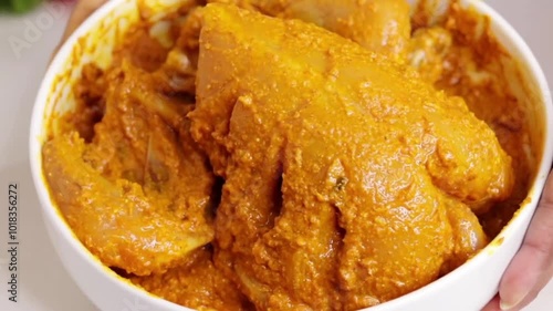 Raw chicken marinate for Grill Chicken in bowl