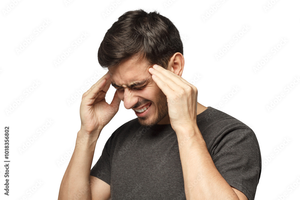 Close-up of young man touching temples with fingers as if suffering from severe migraine, feeling sick Close-up of young man touching temples with fingers as if suffering from severe migraine, feeling sick