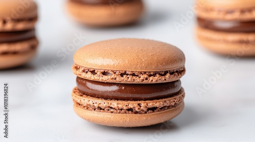 Delicious macaron with rich chocolate filling, perfect for dessert lovers and food photography enthusiasts. photo