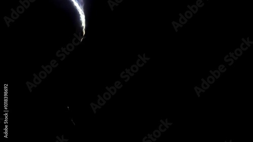 Lightning bolts striking downwards on a black background. Ideal for representing danger, electricity, and power