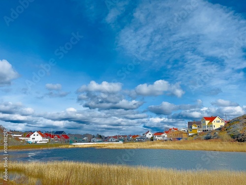 A view of red wooden houses on Donso Archipelago island . photo