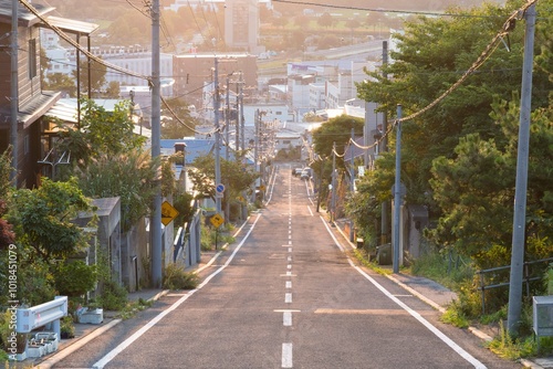 早朝の住宅街 街へと続く下り坂 北海道室蘭市、日本 photo