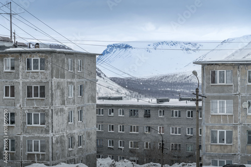 The Khibiny mountains and communism era apartment buildings during the snowy winter at Kirovsk, Murmansk region, Russian North.
