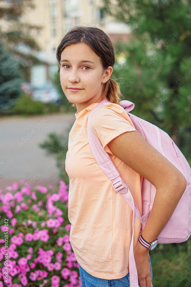 Schoolchild, teenage student girl with school bag backpack hold book outside. Children school and education concept. Happy girl face, positive and smiling emotions Schoolchild, teenage student girl with school bag backpack hold book outside. Children school and education concept. Happy girl face, positive and smiling emotions