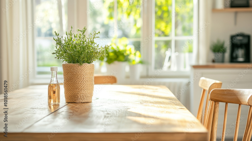 A cozy dining area featuring wooden table adorned with potted plant and glass bottle. warm sunlight filters through windows, creating serene atmosphere A cozy dining area featuring wooden table adorned with potted plant and glass bottle. warm sunlight filters through windows, creating serene atmosphere