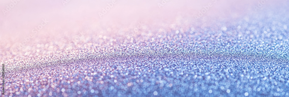 A shimmering surface of glitter creates mesmerizing effect with soft hues of pink and blue, evoking sense of magic and wonder A shimmering surface of glitter creates mesmerizing effect with soft hues of pink and blue, evoking sense of magic and wonder