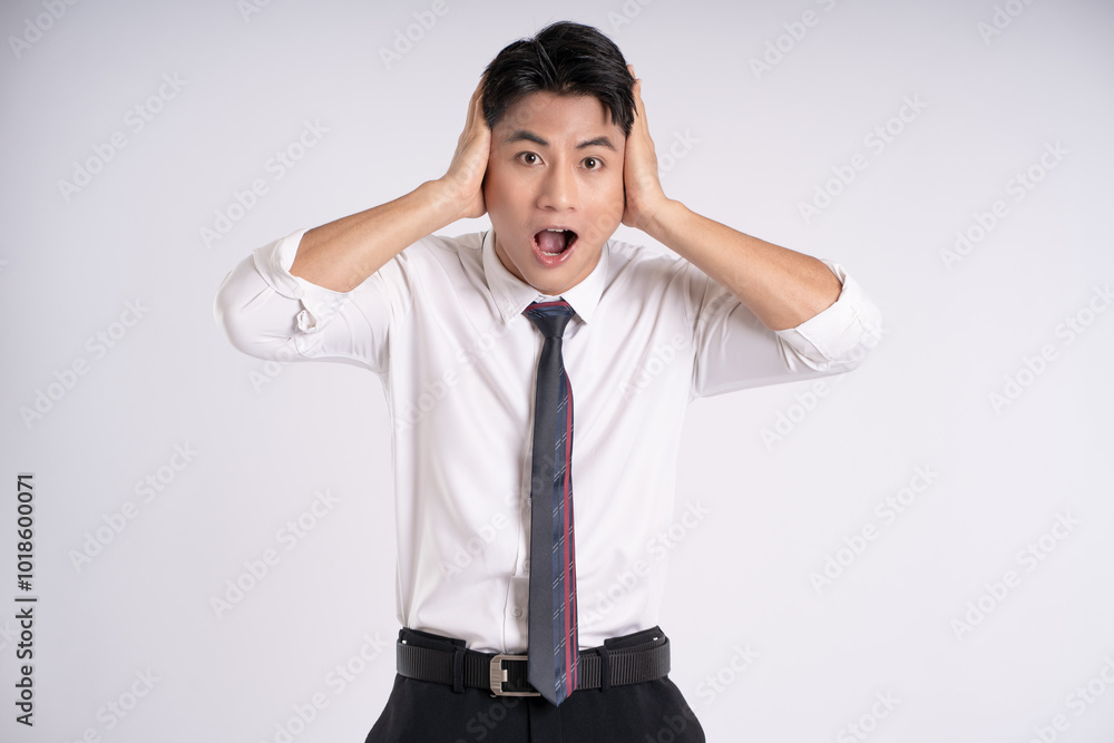 Portrait of young Asian business man posing on white background Portrait of young Asian business man posing on white background