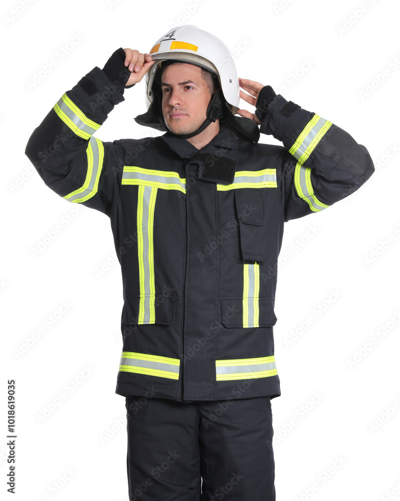 Portrait of firefighter in uniform wearing helmet on white background Portrait of firefighter in uniform wearing helmet on white background