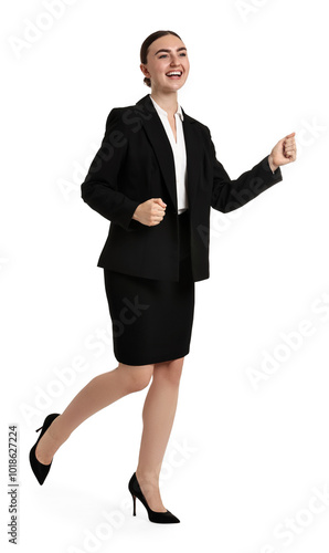 Young businesswoman in suit running on white background