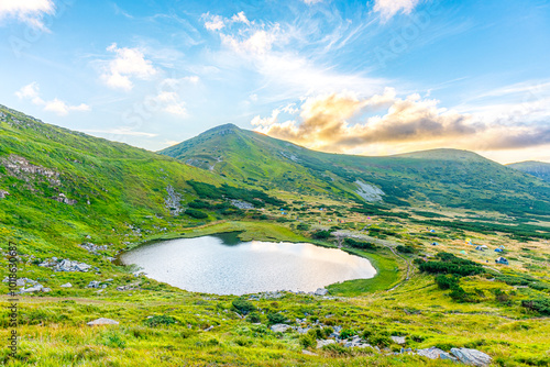 Hoverla, Ukraine - September 01, 2024: Lake Nesamovyte at the foot of Mount Turkul. Chornohora ridge. Ukrainian Carpathians.