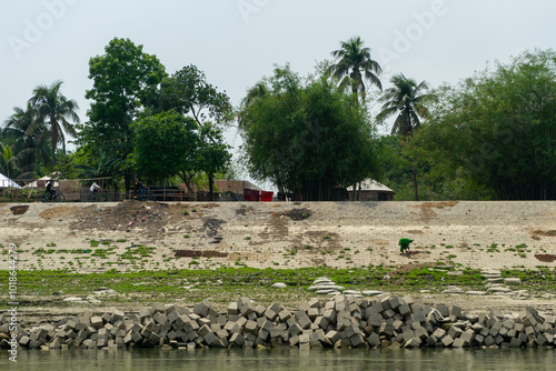 concrete cubes that serve as coastal protection against river erosion. Fortified bank of Ganges (Padma) River in Bangladesh.