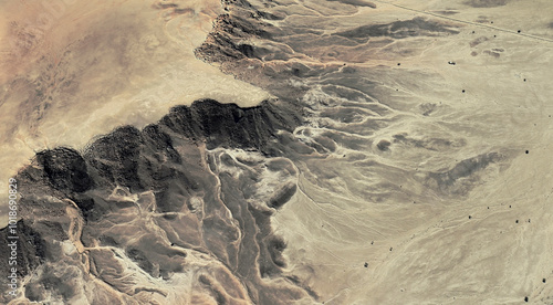 The landscape of the sandy desert in Qatar from a bird's eye view
