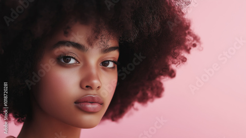 Wallpaper Mural Portrait of young woman with afro hairstyle, soft pink background, natural beauty, expressive eyes, fresh look, confident expression, fashion concept Torontodigital.ca