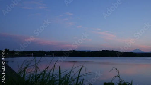 Lake Sayama and Mt. Fuji during blue hour in Japan.  4K,H.264,420,8bit. photo