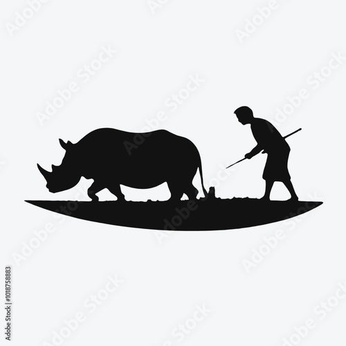 A silhouette of a person herding a rhinoceros in a grassy field 