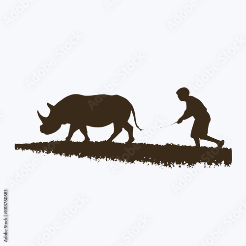 A silhouette of a person herding a rhinoceros in a grassy field 