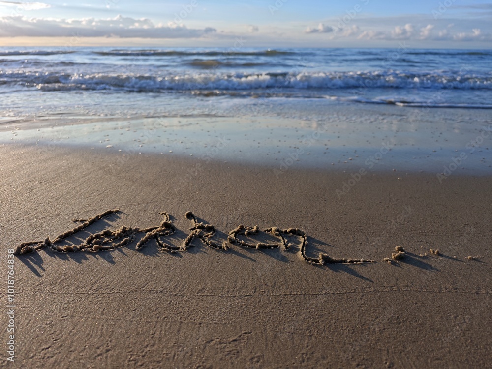 Obraz premium Lökken Schriftzug im Strandsand