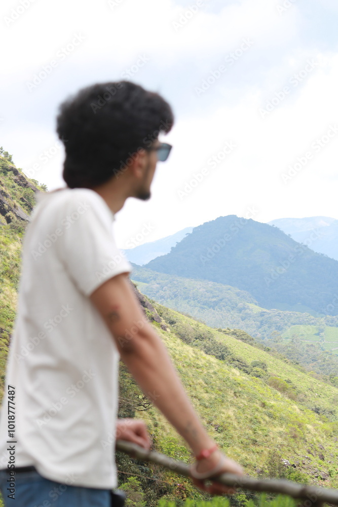 person on the top of a mountain person on the top of a mountain