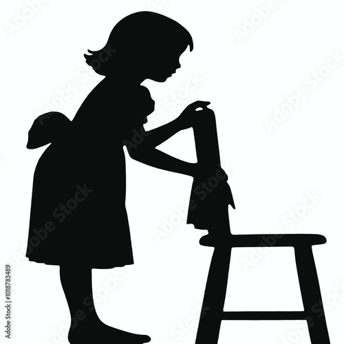 A young girl with short hair clinging on a chair, silhouetted against a plain background