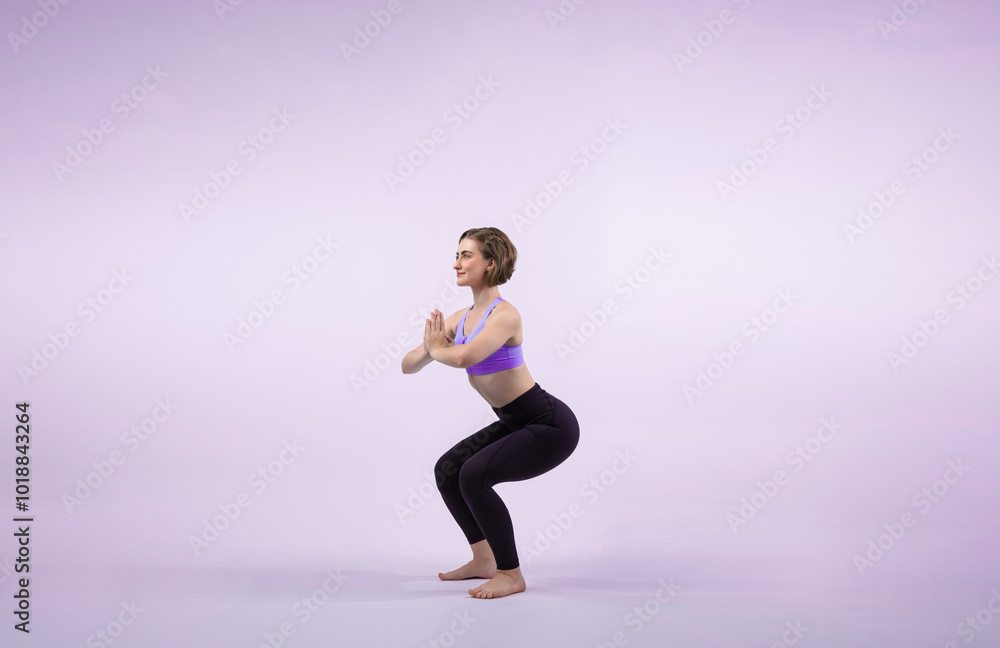 Full body length gaiety shot athletic and sporty woman doing healthy and meditative yoga exercise workout posture on isolated background. Healthy active and body care lifestyle
