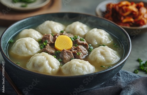 Nourishing dumpling soup with tender beef and vibrant vegetables served in a ...