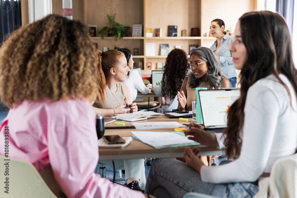 Group of people working in an office. Group of people working in an office.