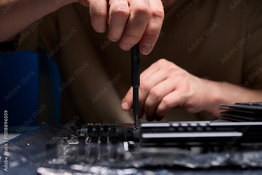 Fototapeta premium Assembling computer components with precision tools for flawless execution and assembly