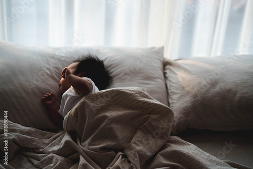 Peaceful Baby Sleeping on Pillow in Soft Morning Light