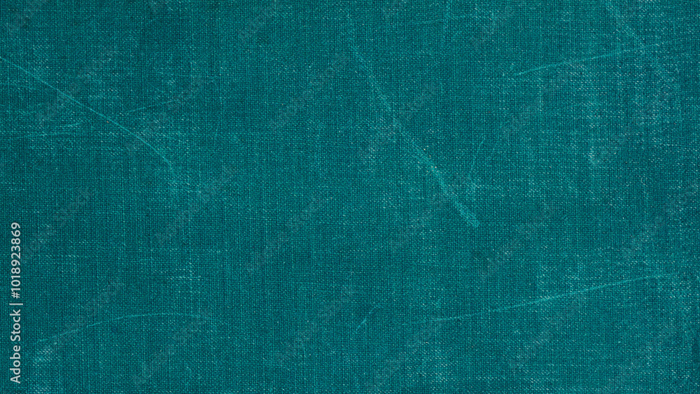 Fototapeta premium Close up view of textured teal fabric, pattern, vibrant color
