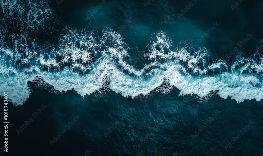 Top down aerial view of moody ocean wave
