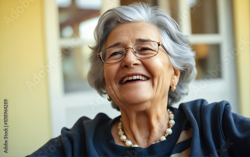 Portrait of an elderly woman enjoying life on a warm summer evening.