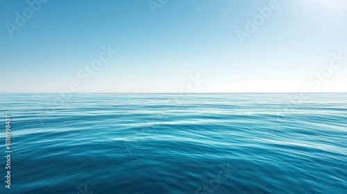 Tranquil minimalist landscape depicting a smooth blue sea surface with calm waters, a clear horizon, and sky, providing a serene natural background.