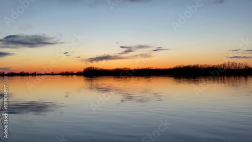 Wallpaper Mural Colorful sunset sky with dark clouds with trees reflection on calm river water  Torontodigital.ca