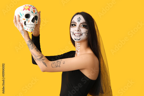 Young woman dressed as dead...