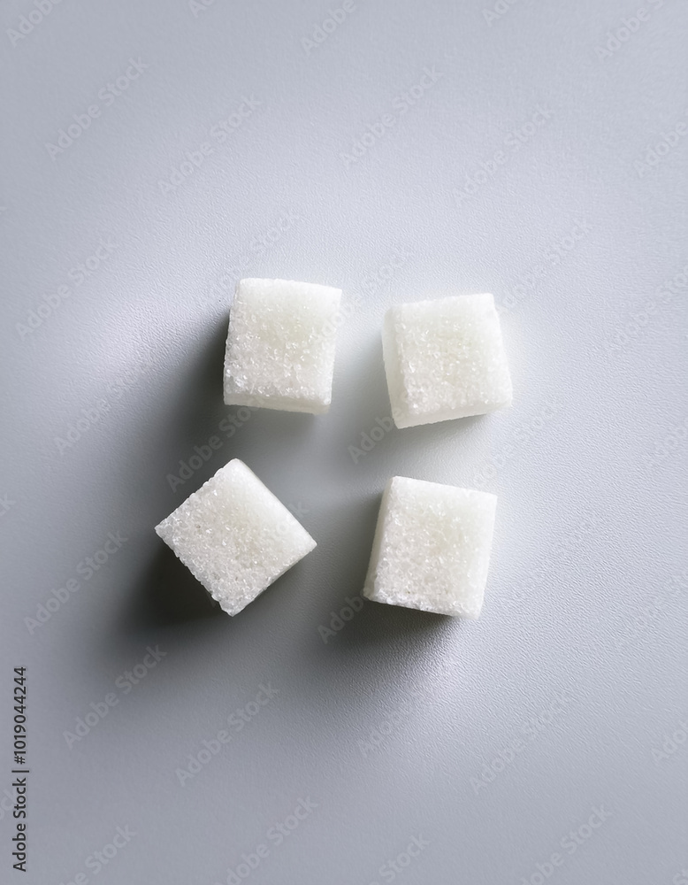 white sugar cubes, isolated on a clean white background white sugar cubes, isolated on a clean white background