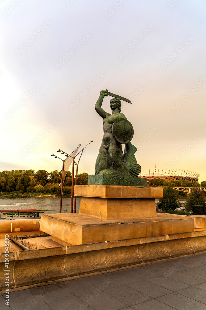 Statue of a Warrior with Sword and Shield at Sunset located in Warsaw, Poland