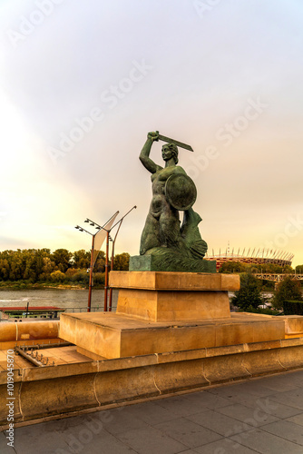 Statue of a Warrior with Sword and Shield at Sunset located in Warsaw, Poland