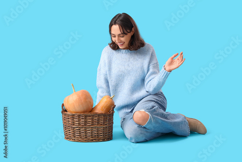 Young woman with wicker bas...