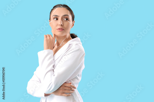 Young woman with painted fa...