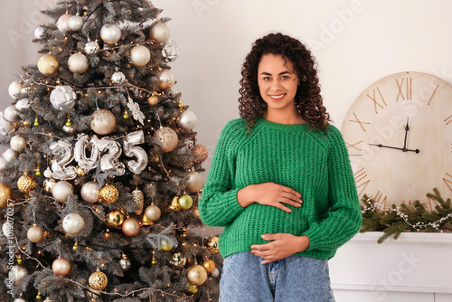Pregnant woman celebrating ...
