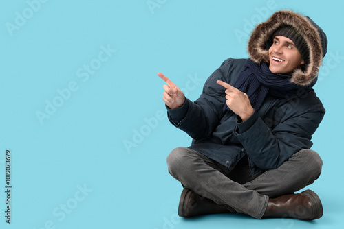 Young man in stylish puffer...